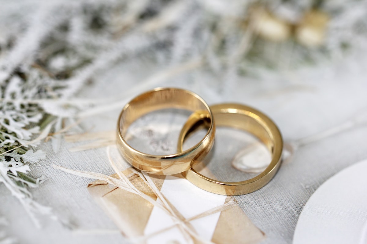 Wedding rings on flower petals
